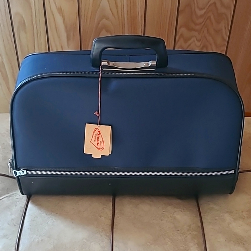 Vintage Navy blue  and Black, Dionite Luggage bag, never used.